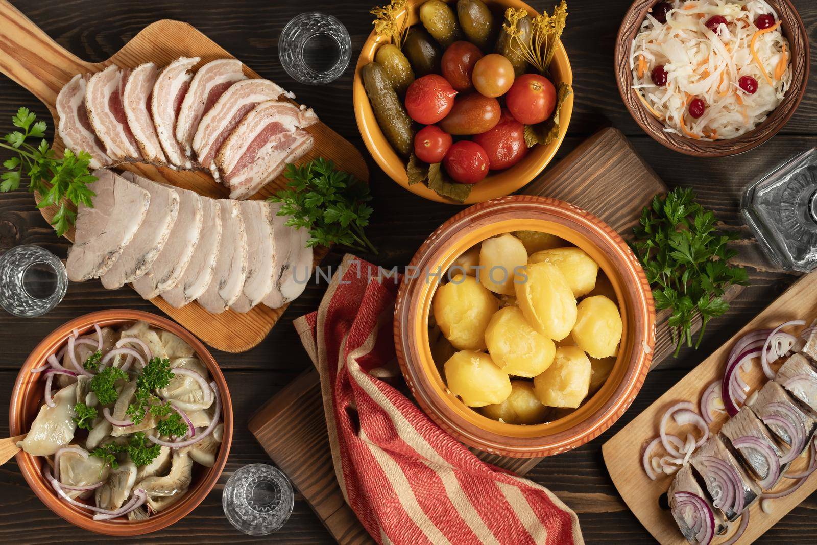 Festive table in the Russian village. Table set for dinner with traditional snacks and dishs of Russian cuisine. top view, flat lay by galsand