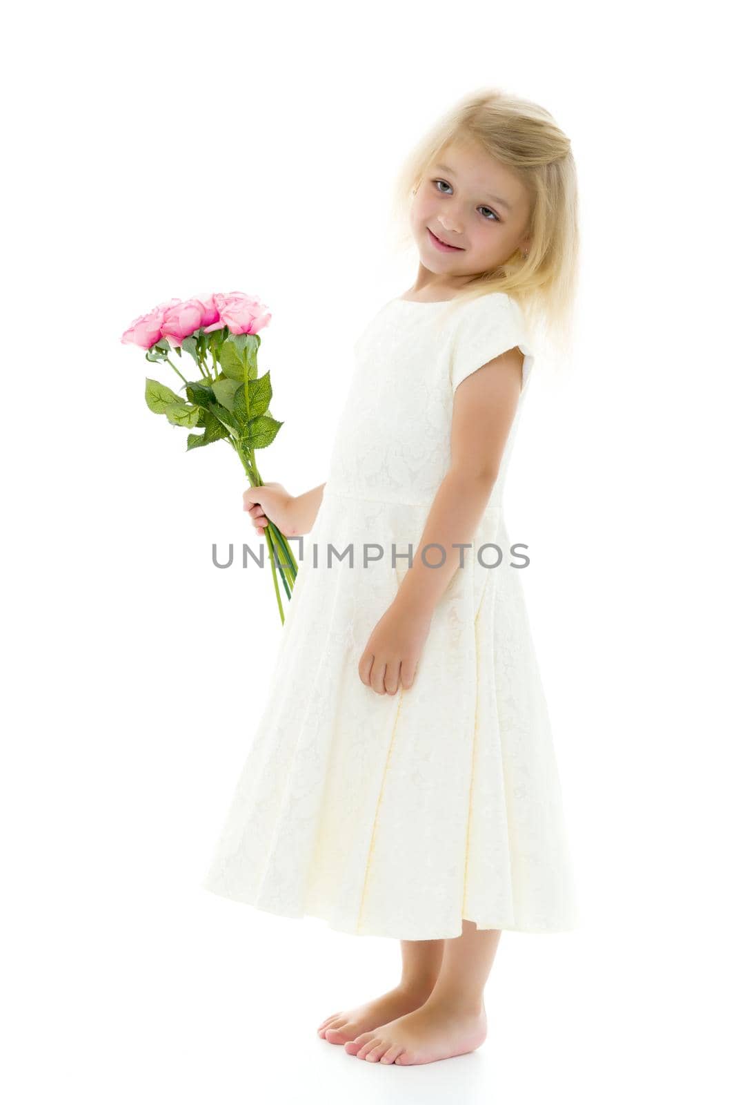 Little girl with a beautiful bouquet of flowers. The concept of holidays, family and children. Isolated on white background.