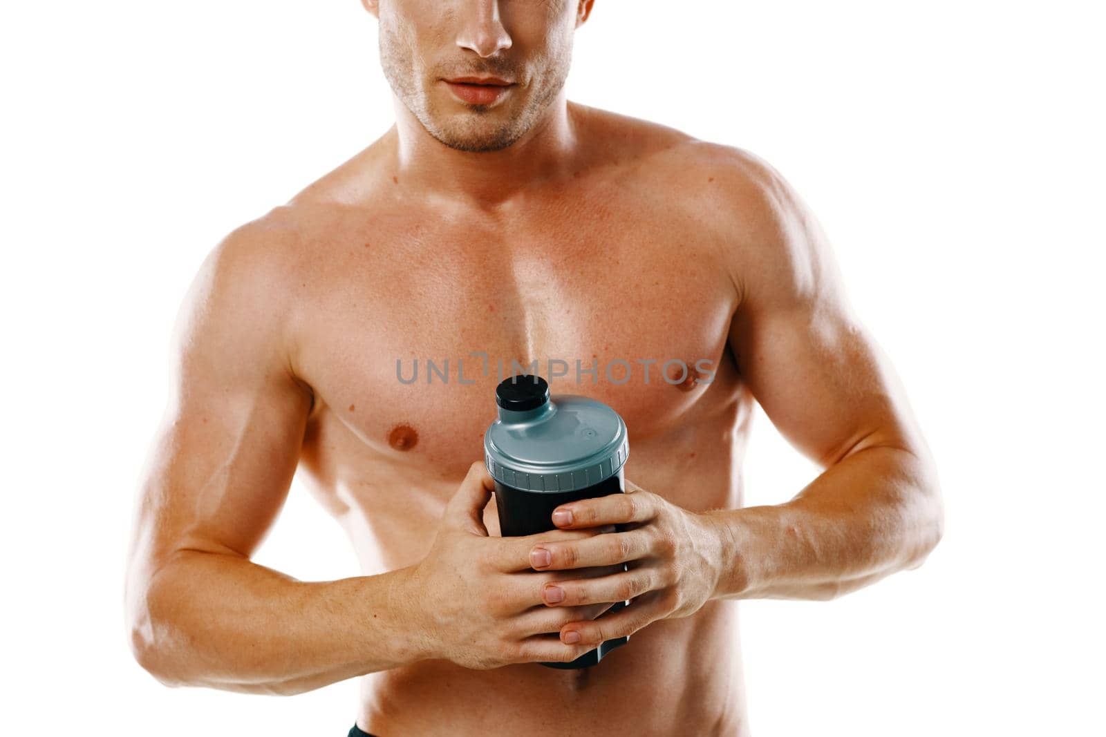 athletic man with pumped up muscular body sports drink light background by Vichizh