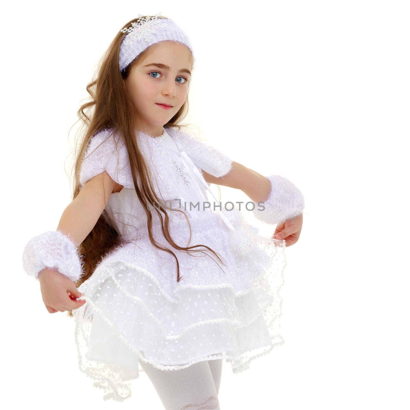 Beautiful little girl close-up. The concept of beauty and fashion, happy childhood. Isolated on white background.