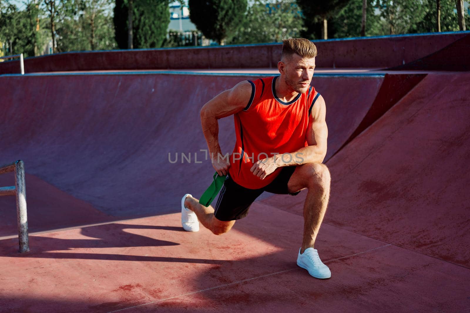 athletic man in red jersey workout exercise pumped up body by Vichizh