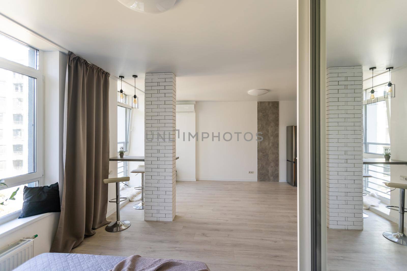 Kitchen and living room of loft apartment