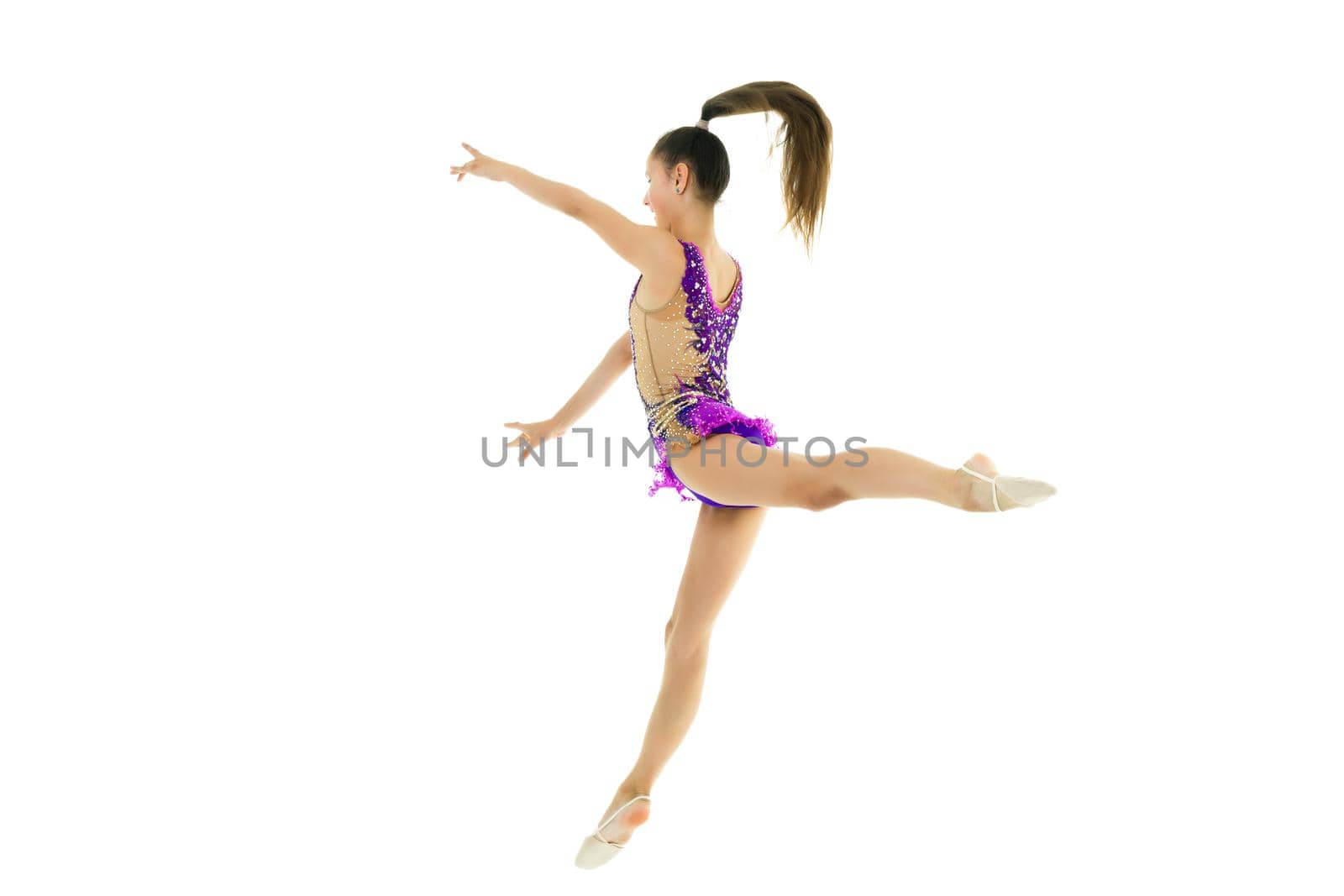 The gymnast perform an acrobatic element. by kolesnikov_studio