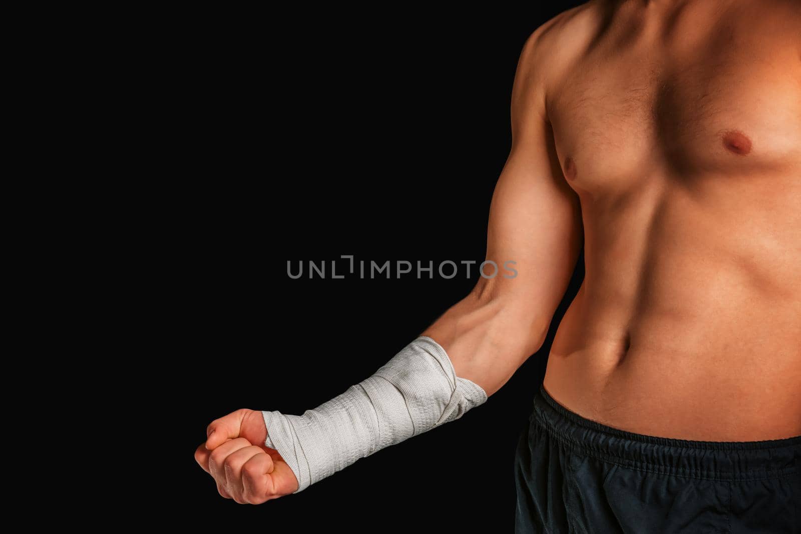 Sportsman with bandaged arm by alexAleksei