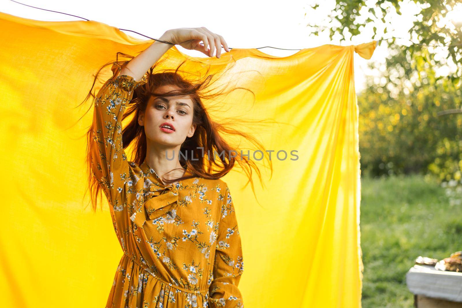 pretty woman in dress posing nature fashion glamor. High quality photo