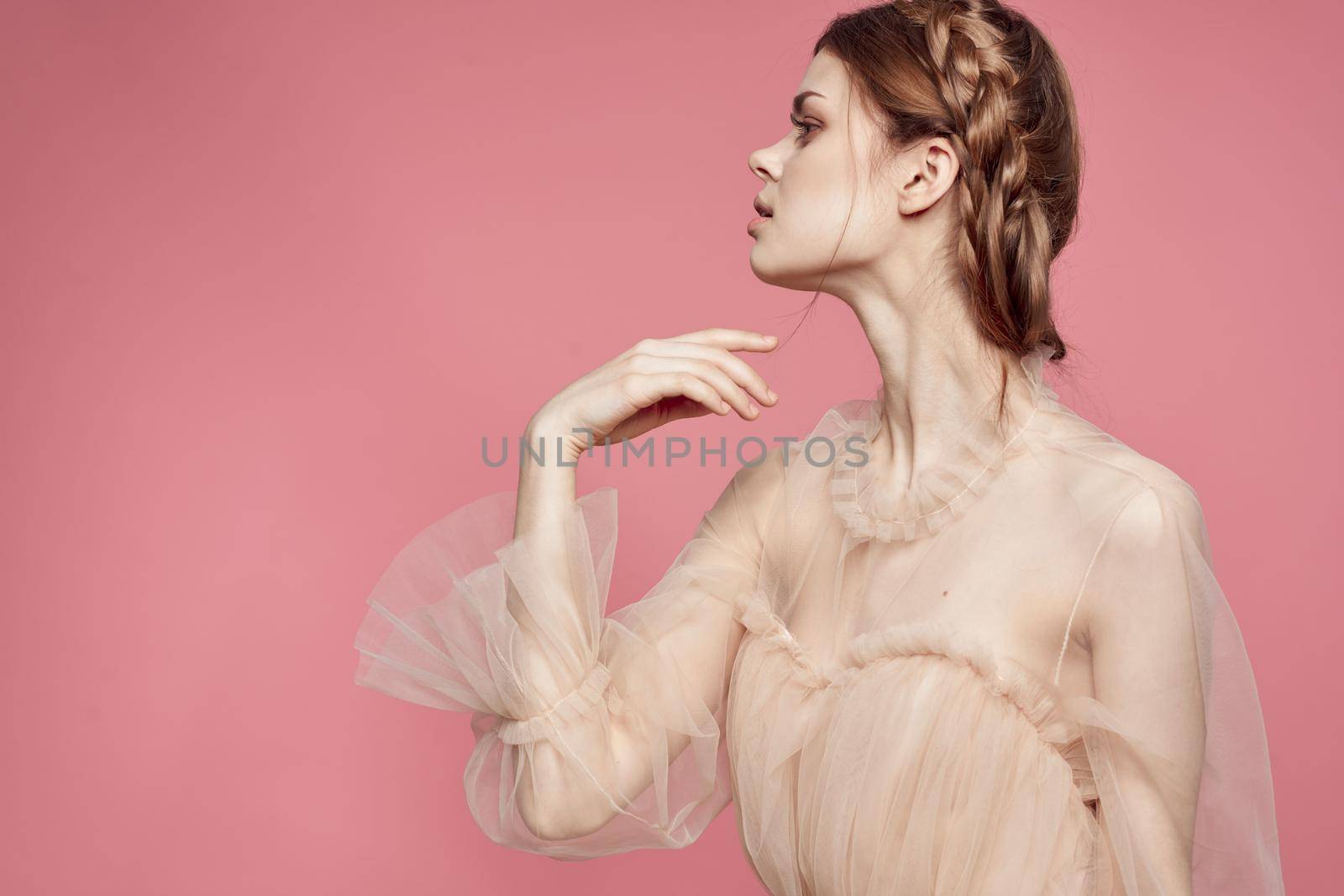 beautiful woman attractive look lifestyle romance pink background. High quality photo