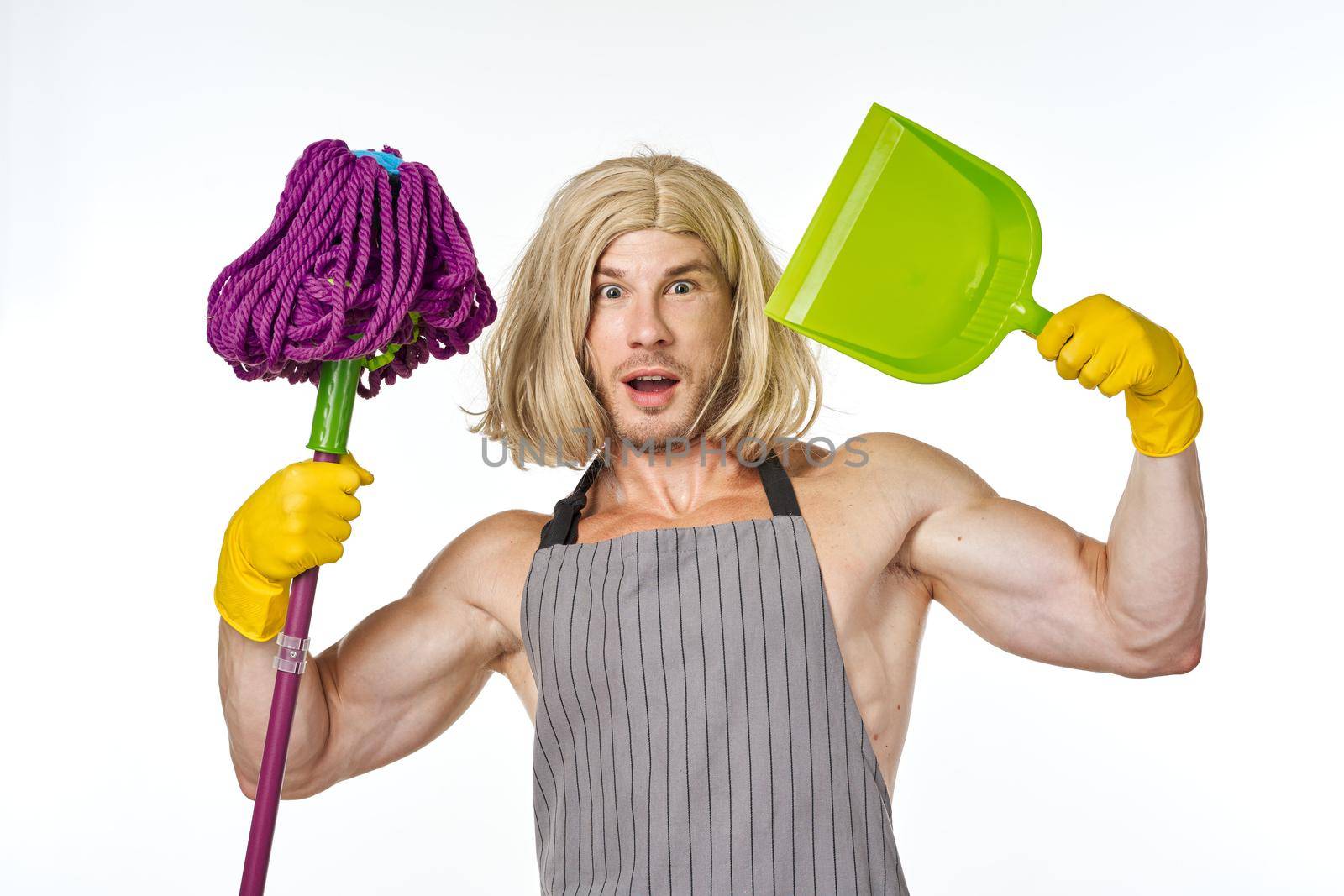Muscled Man in Womens Wig Mop Cleaning Housework. High quality photo