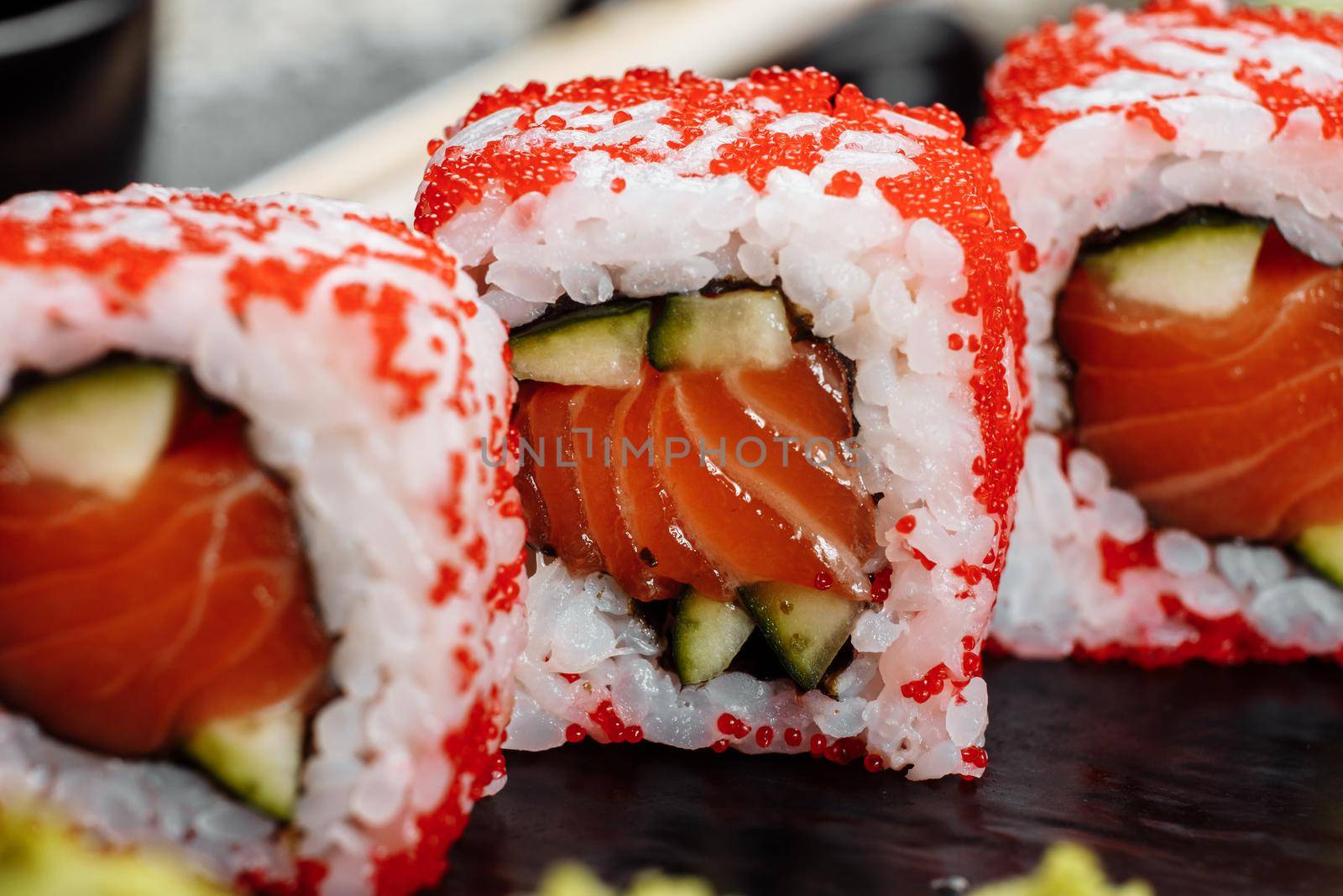 California sushi style rolls, with raw vegetables, food border background by UcheaD