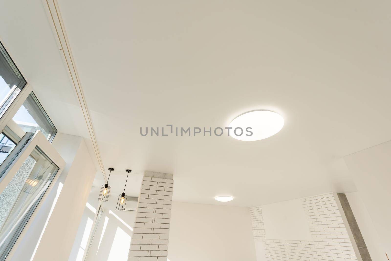 Beautiful built-in lamps in the stretch ceiling