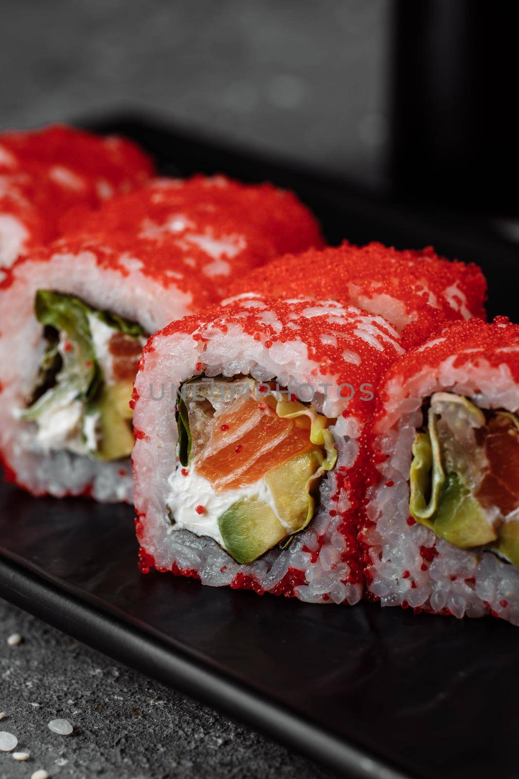 Sushi california roll with tuna in caviar.