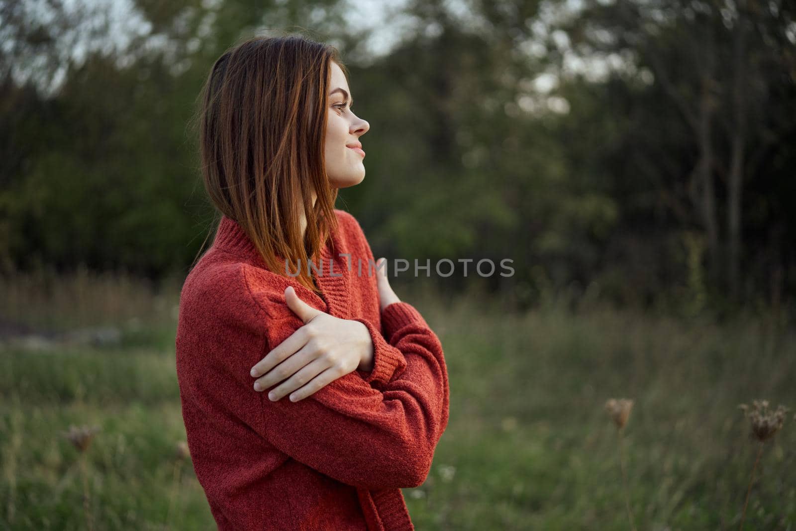 pretty woman in red sweater outdoors walk leisure by Vichizh