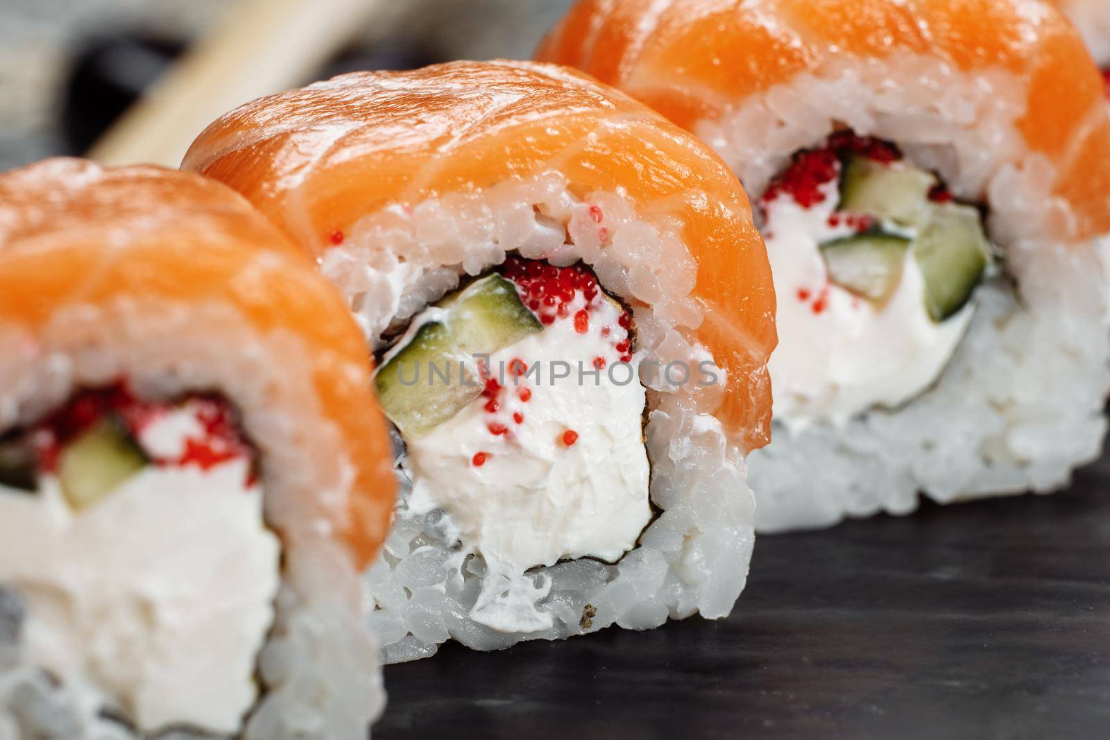 Sushi Philadelphia on a stone decorative plate by UcheaD