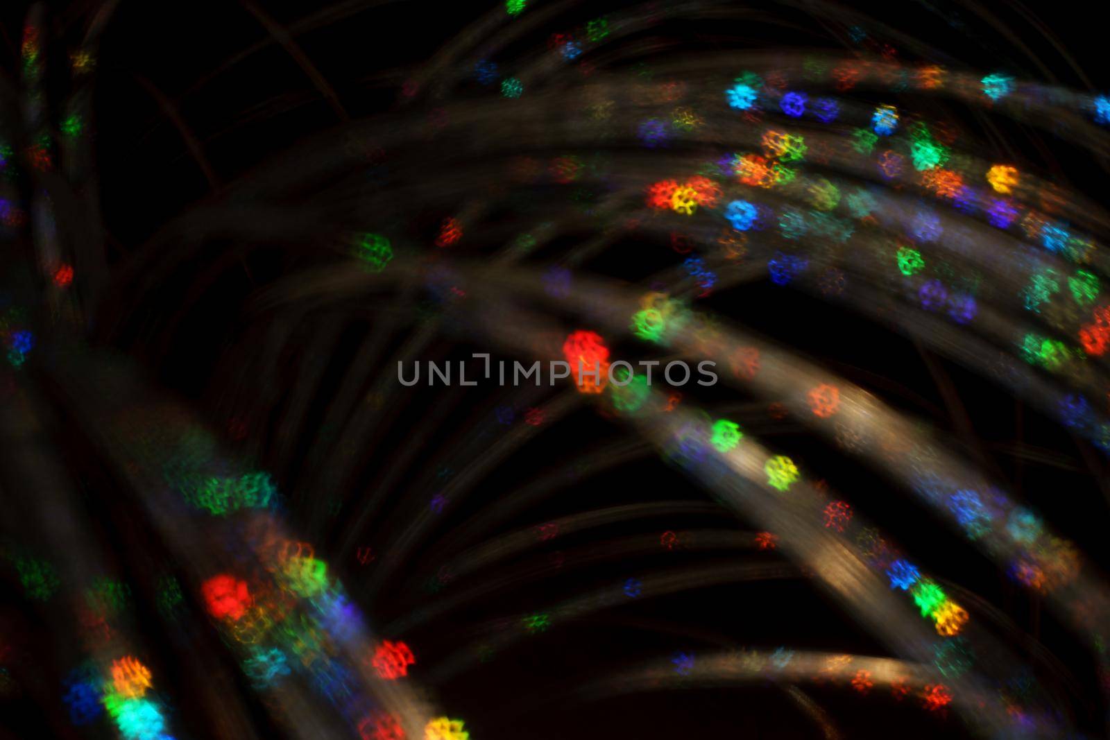 Christmas background. Festive abstract background with bokeh defocused lights and stars.