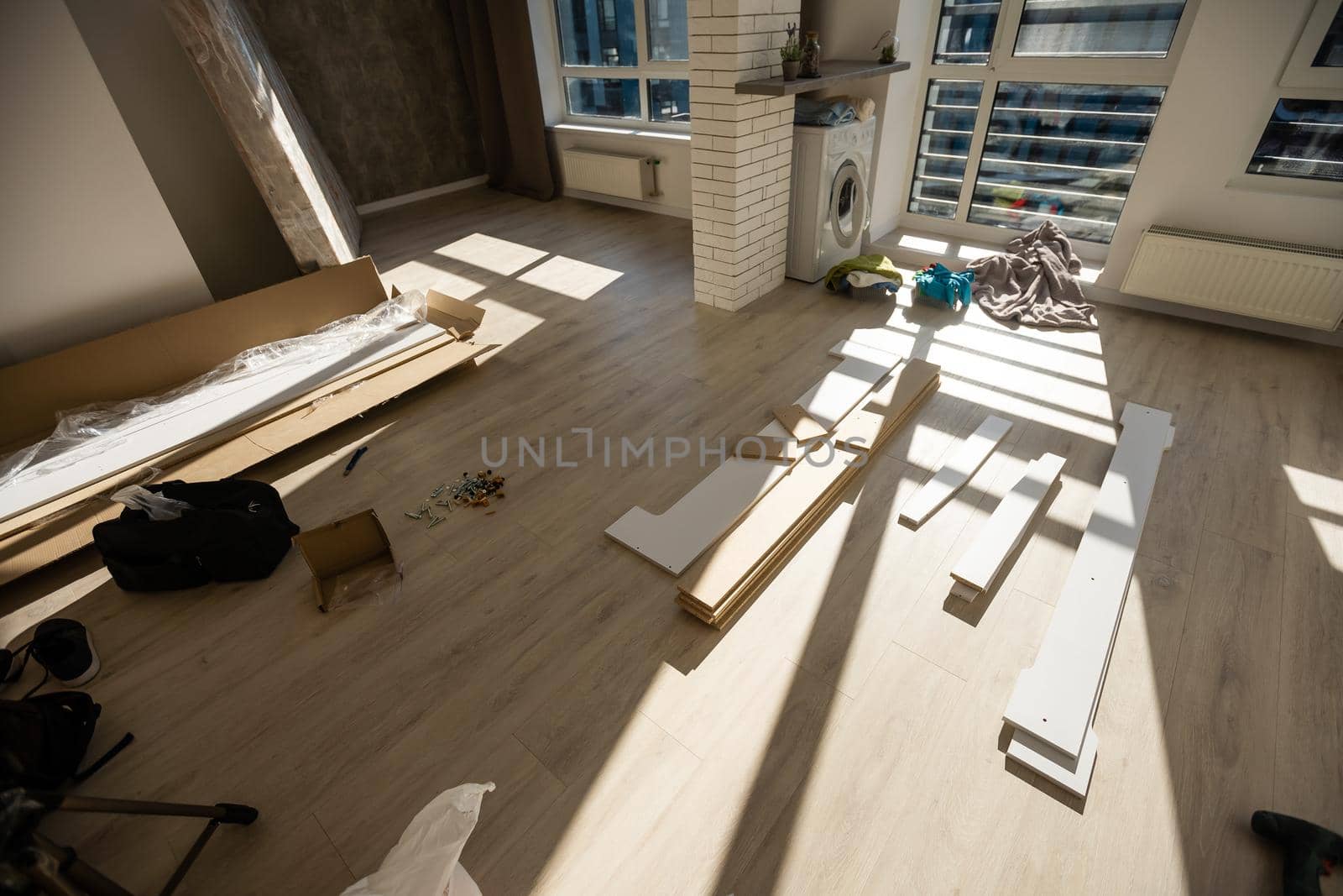 assembly of a double bed made of wood and lamella
