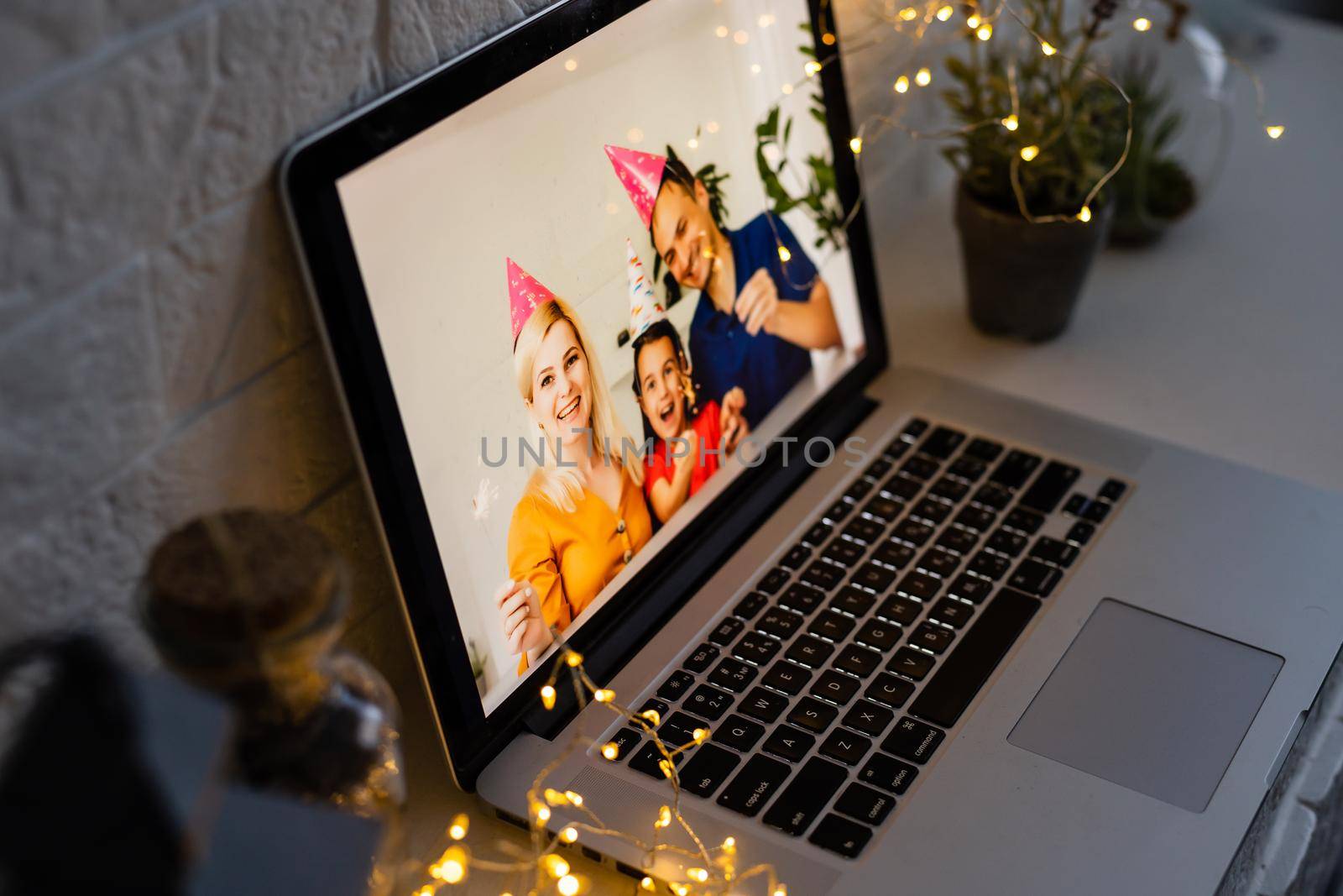 young family video call smiling and looking at webcam web, lovers greet friends merry christmas and happy new year by Andelov13