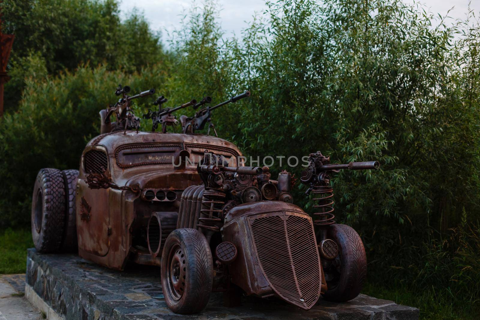 Gurivschina, Ukraine - July 04, 2020: Victoria film studio near Kiev. Film studio in the form of a castle with monsters, zombies car, hut and stranger.