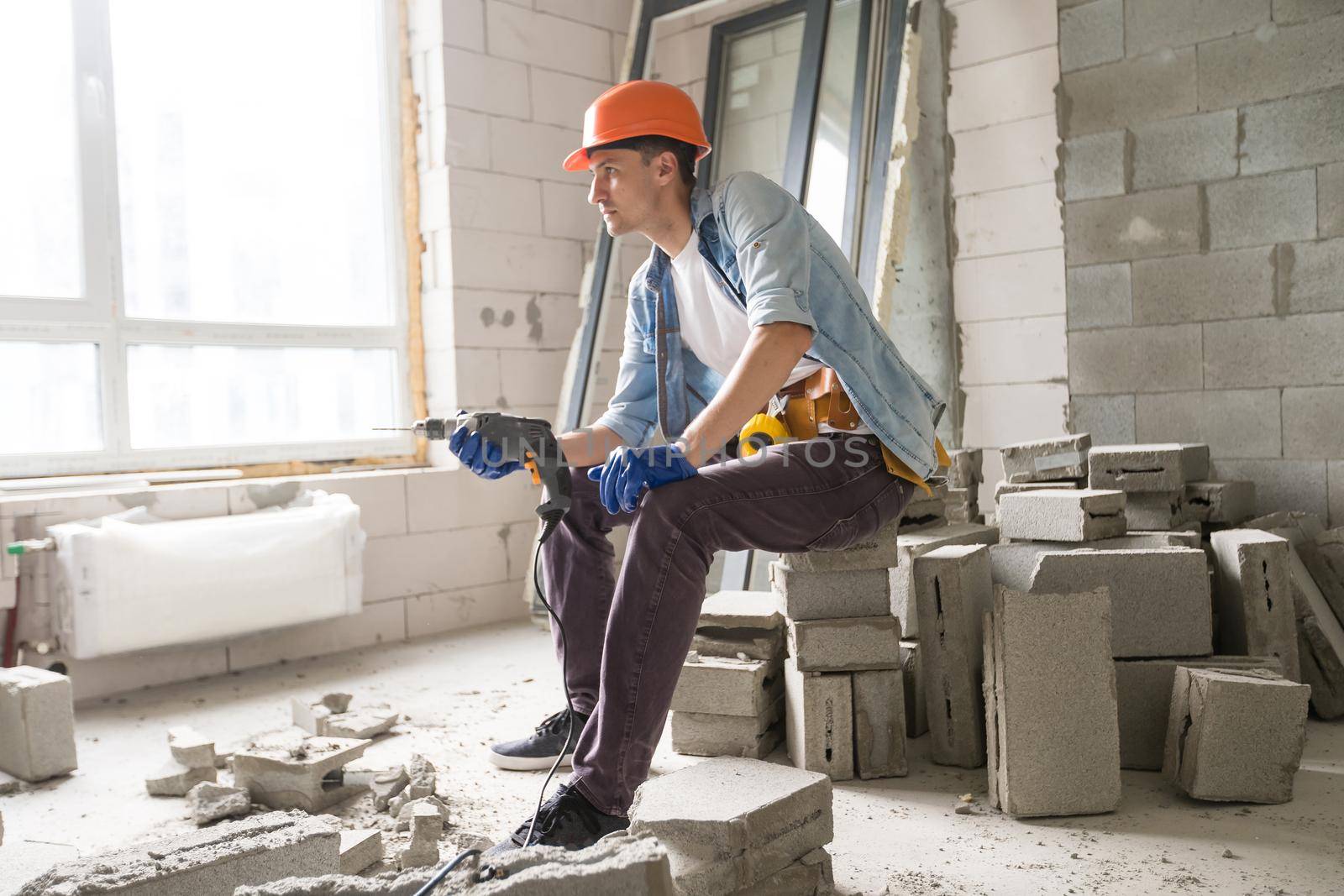 architecture and home renovation concept - foreman for renovation in the apartment