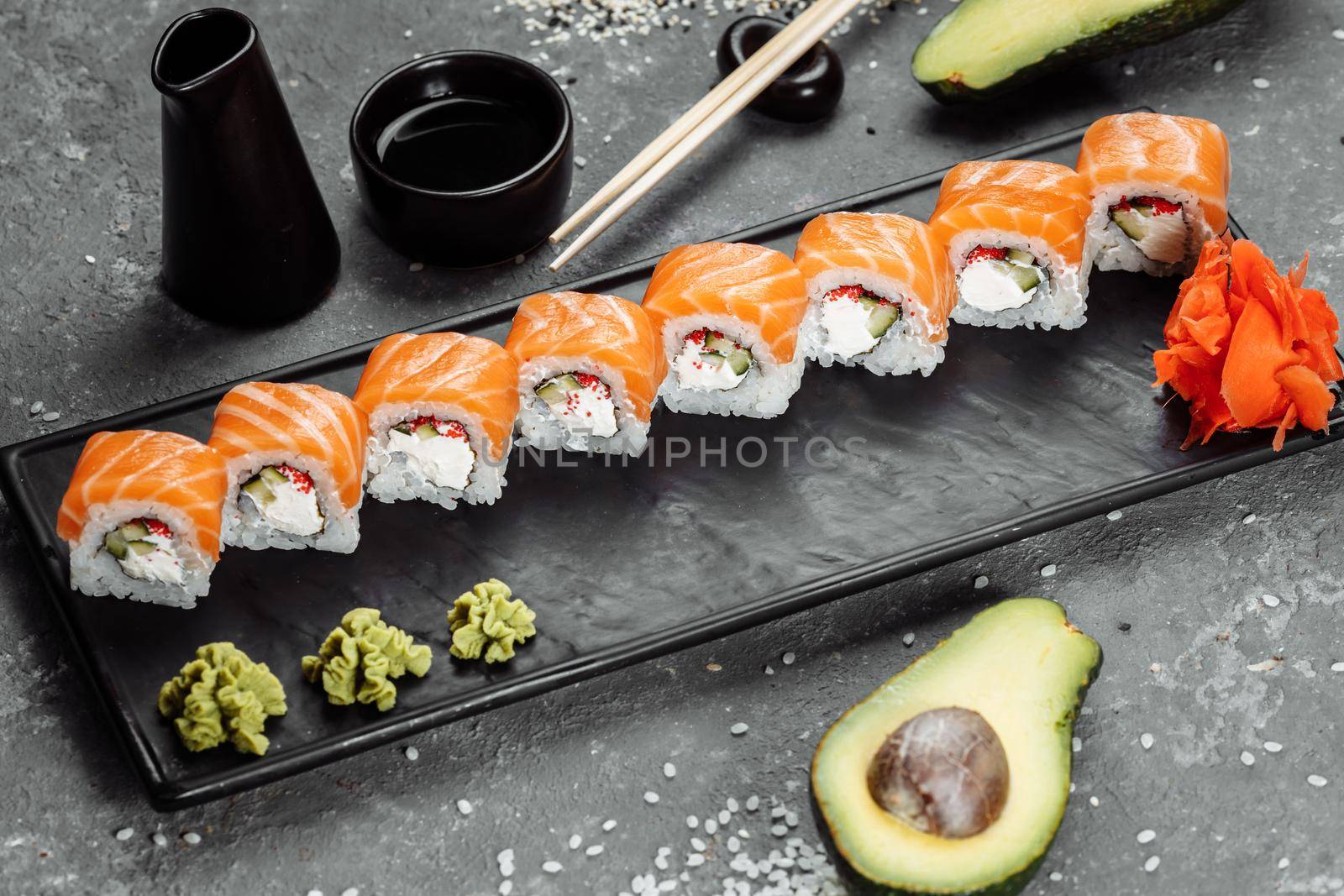 Sushi Philadelphia on a stone decorative plate.