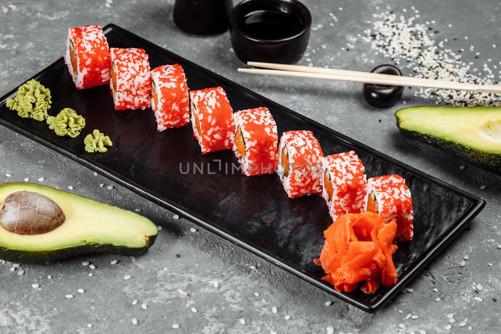California sushi style rolls, with raw vegetables, food border background.