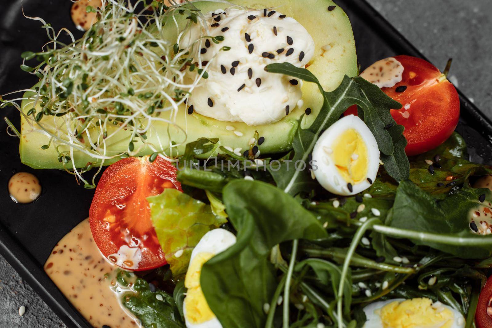 Avocado and cherry tomato salad. Diet breakfast. Healthy food.