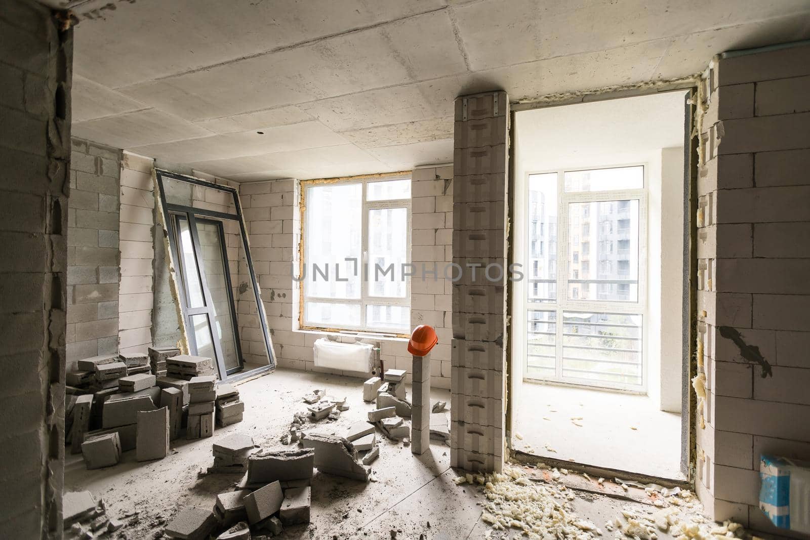 Abandoned house interior, dirty room, rotten peeled walls.