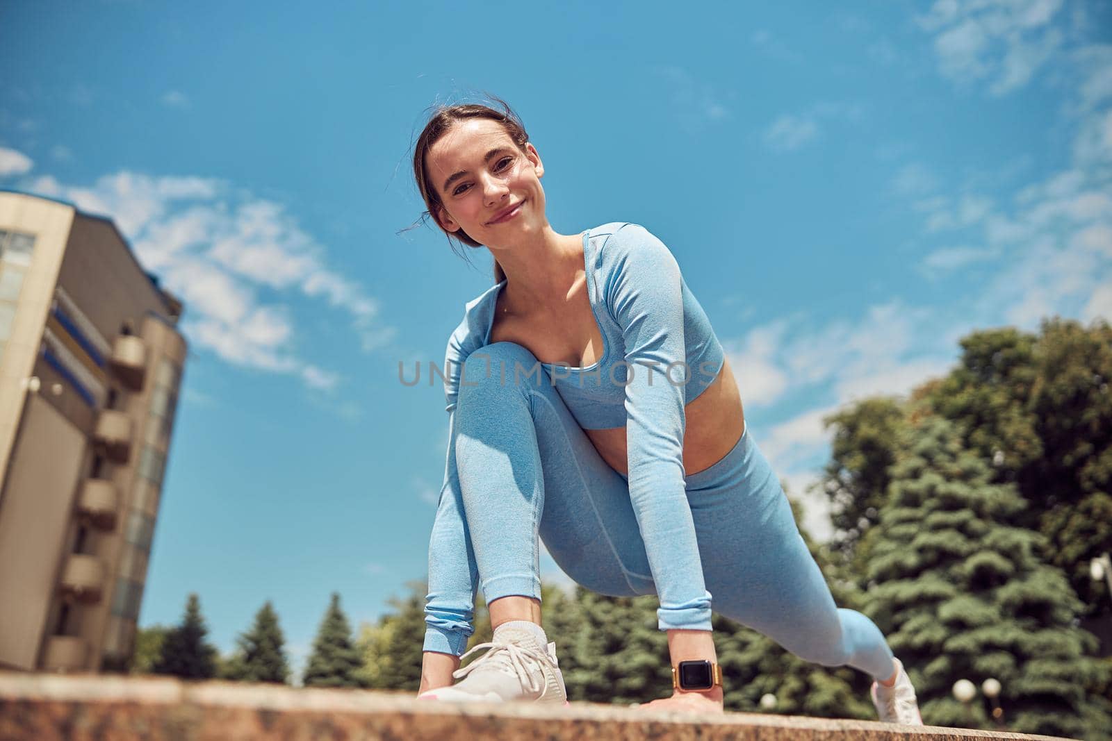 Beautiful fit young woman jogger is running outdoors by Yaroslav_astakhov