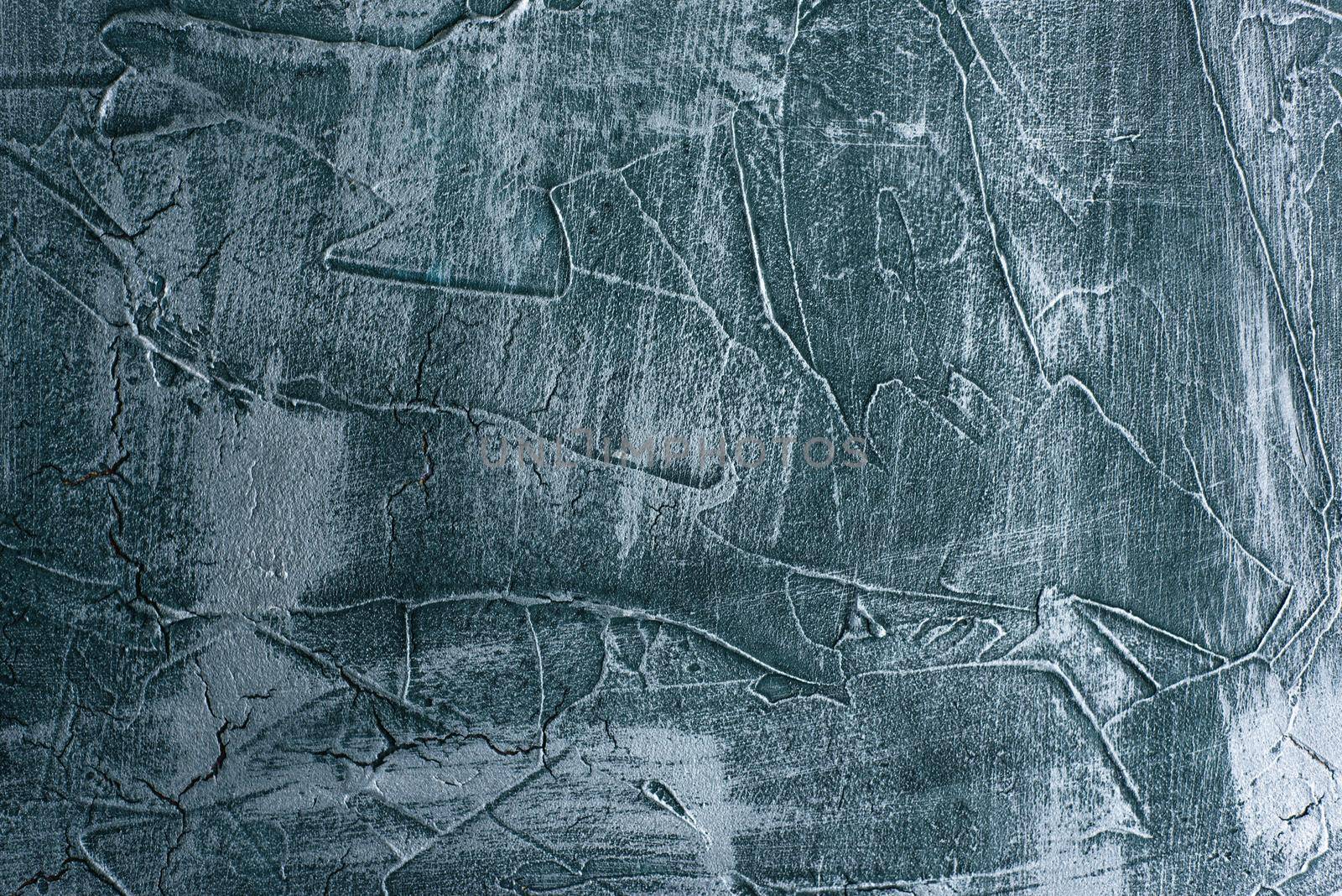 Dramatic blue grunge seamless stone texture venetian plaster background decor. Cracked grungy concrete cement decoration.
