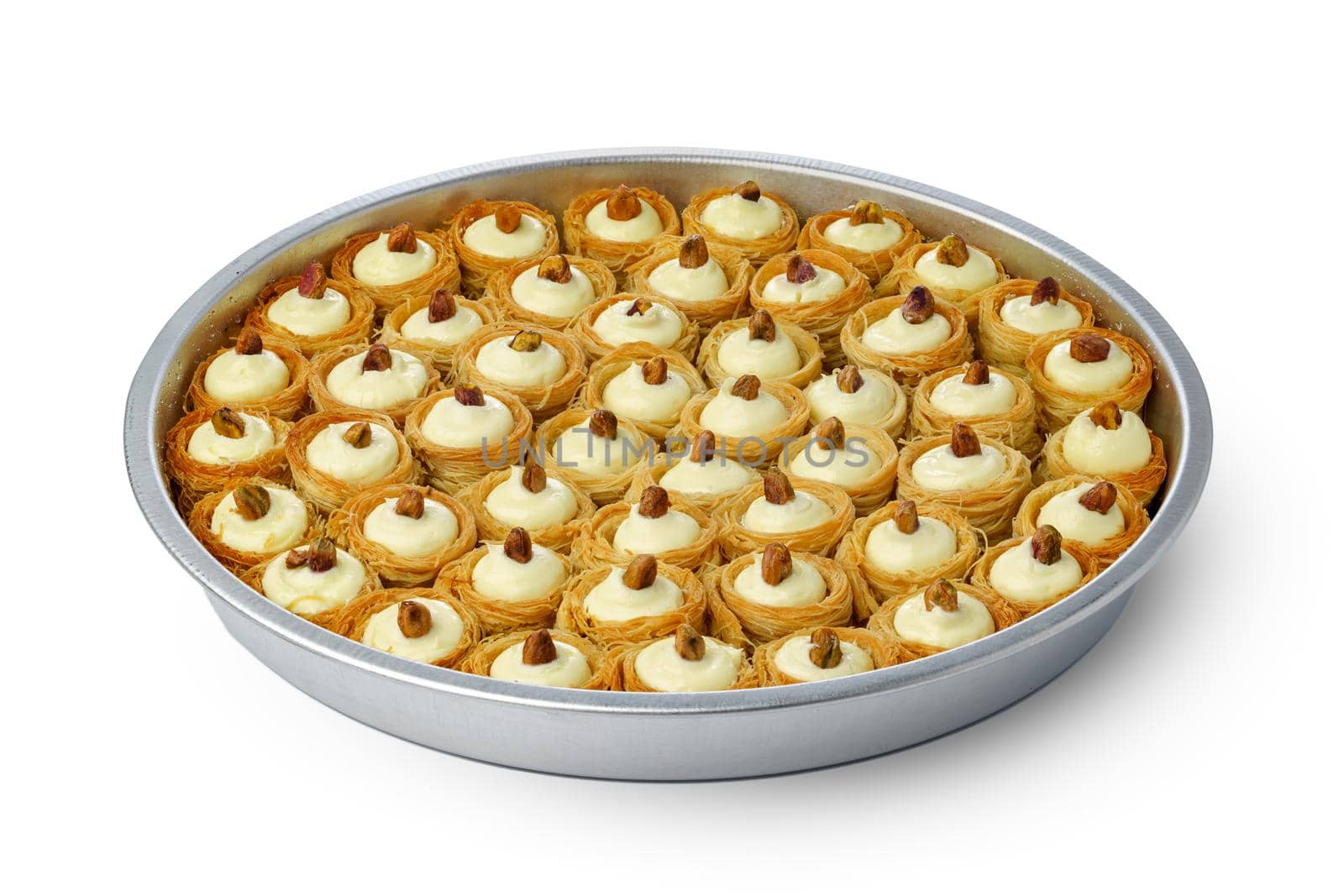 Assortment of Turkish baklava dessert in a white box isolated on white background