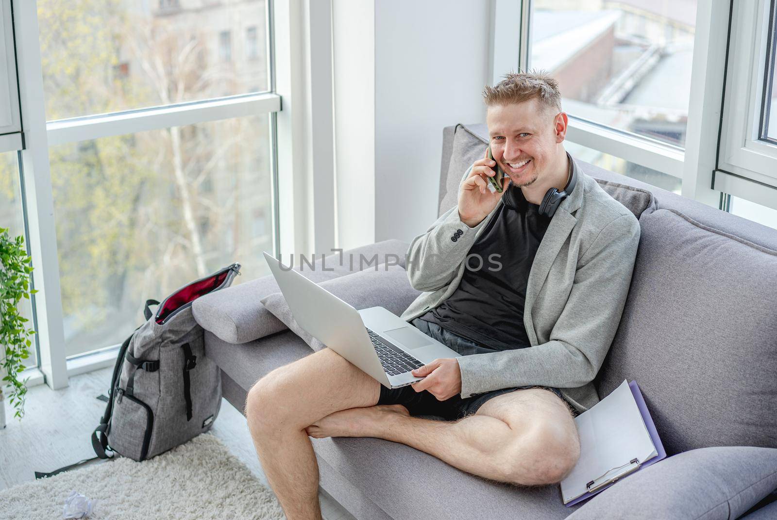 Man working distantly on computer during coronavirus pandemic