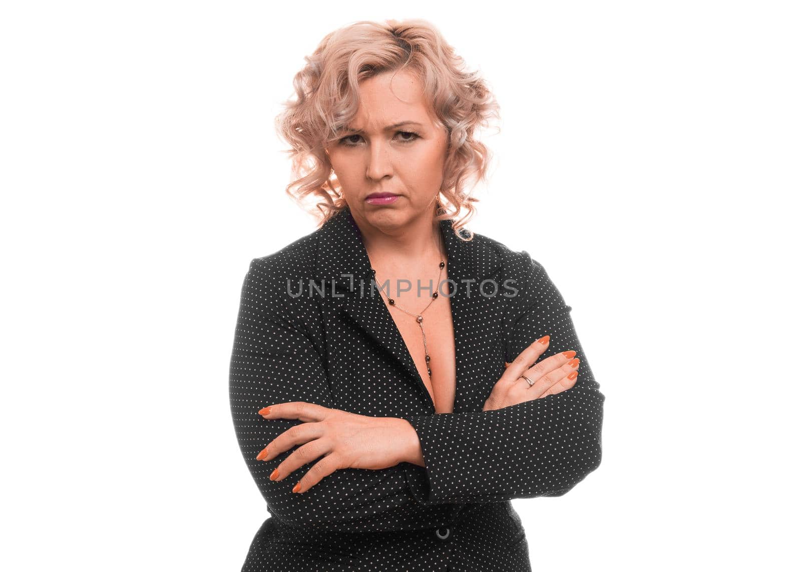 Portrait of an angry middleaged businesswoman over white background. by Stavros