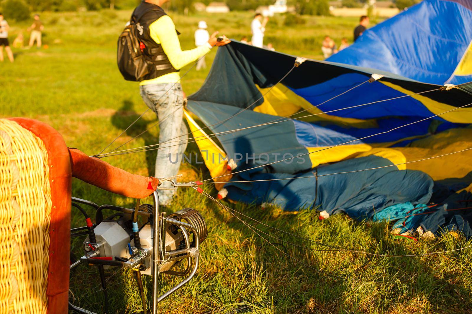 Hot air balloon basket on grass background. This has clipping path.