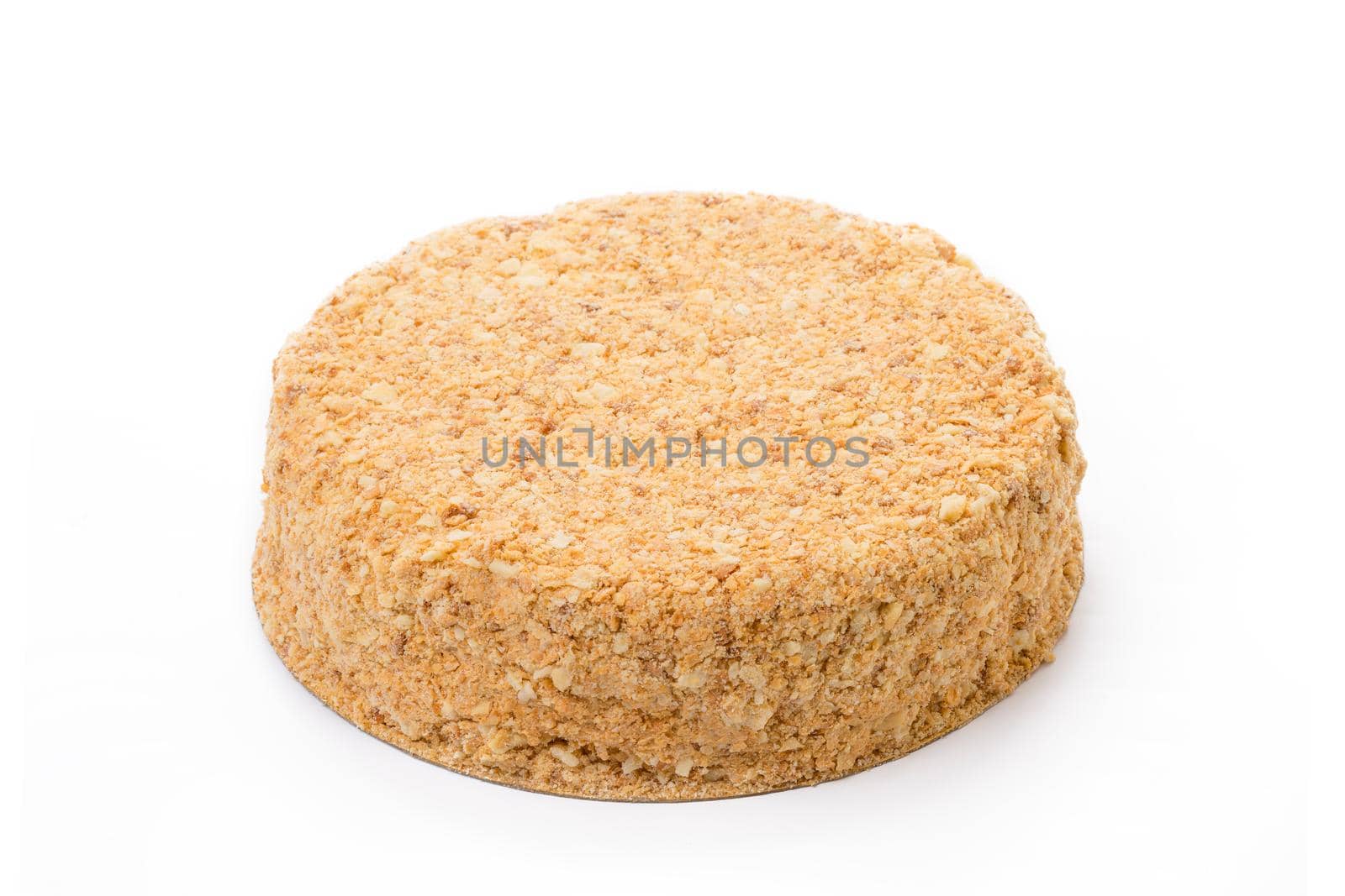 One caramel cake isolated on white background close up