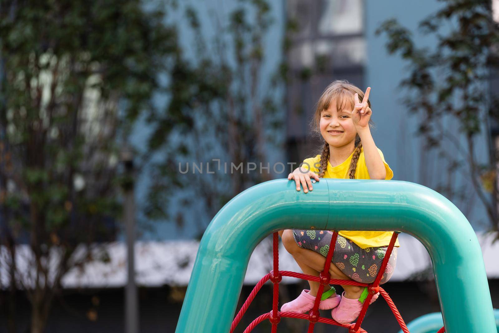 happy excited kids having fun together on playground
