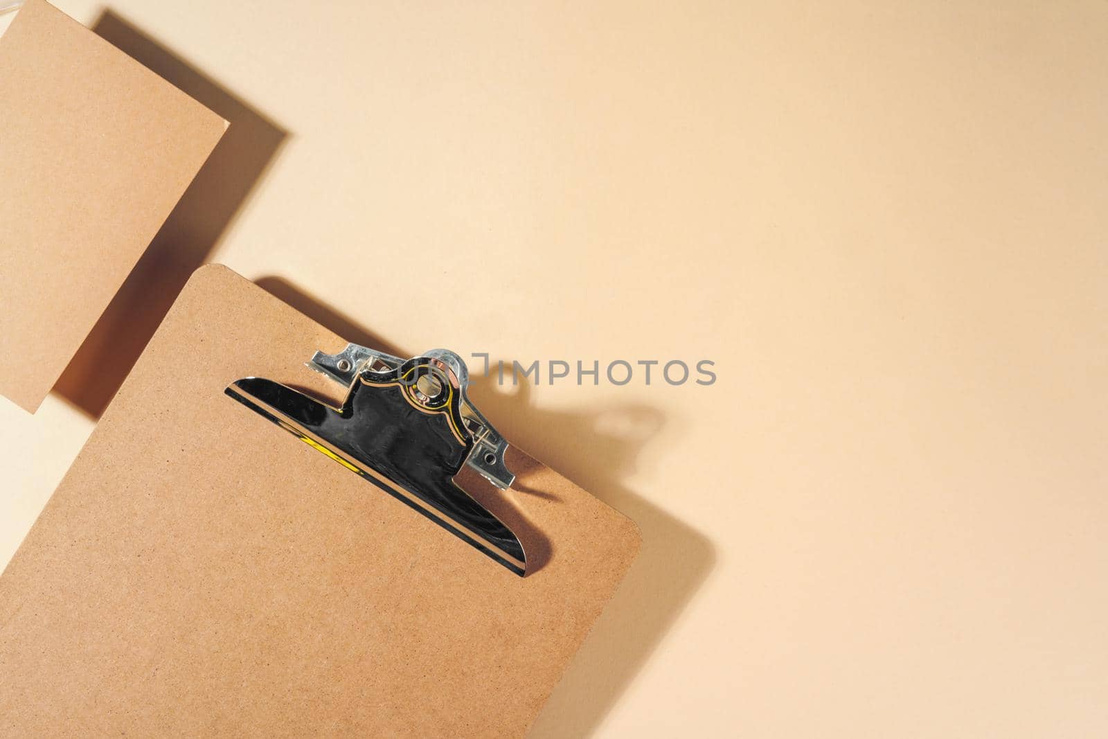 Craft paper letter on beige background top view. High quality photo