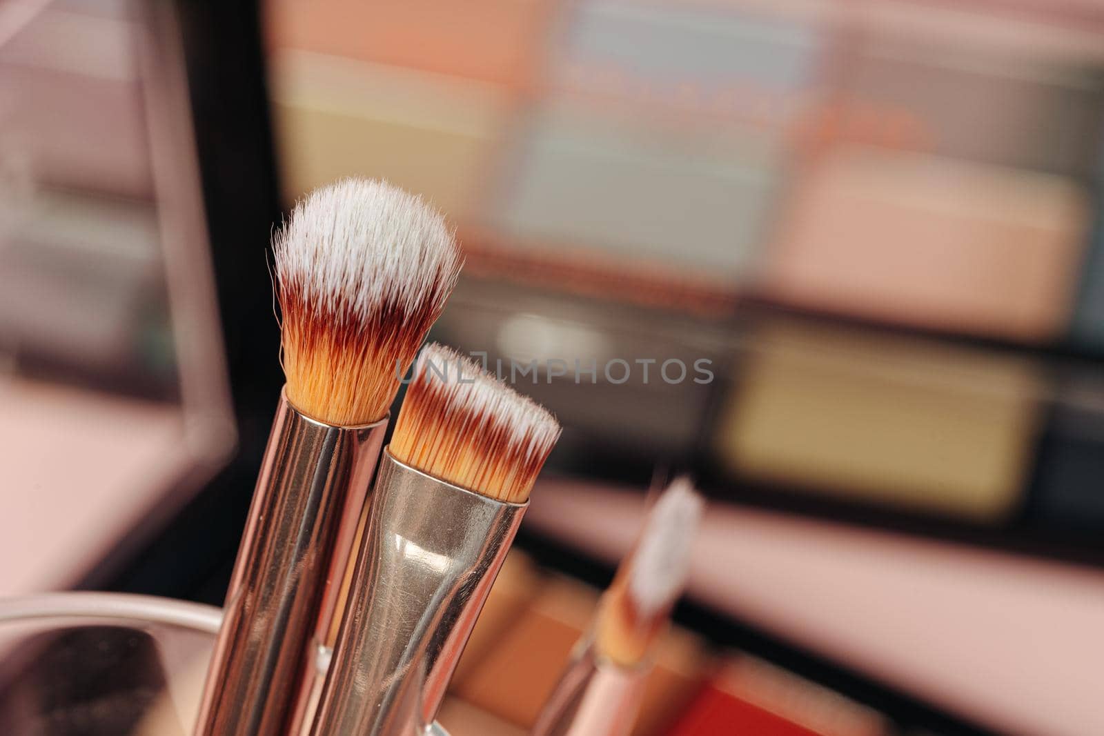decorative cosmetics on pink background