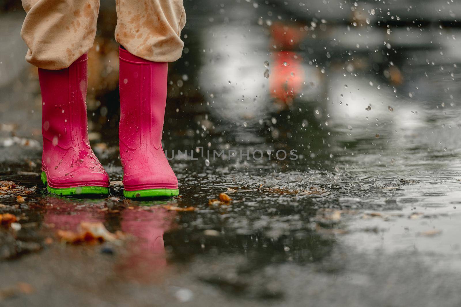 Child in rubber boots by tan4ikk1