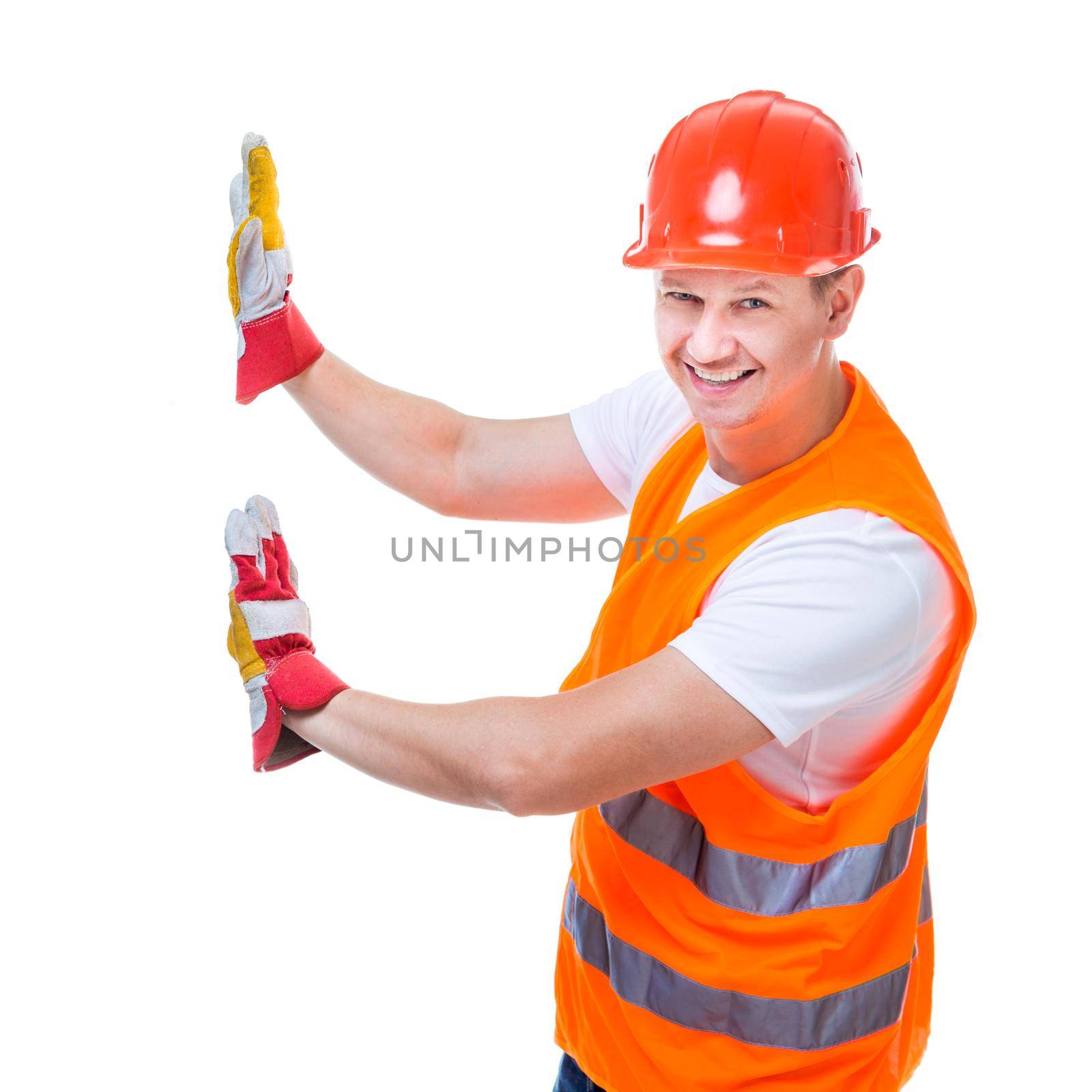 handsome worker man in a helmet on a white background