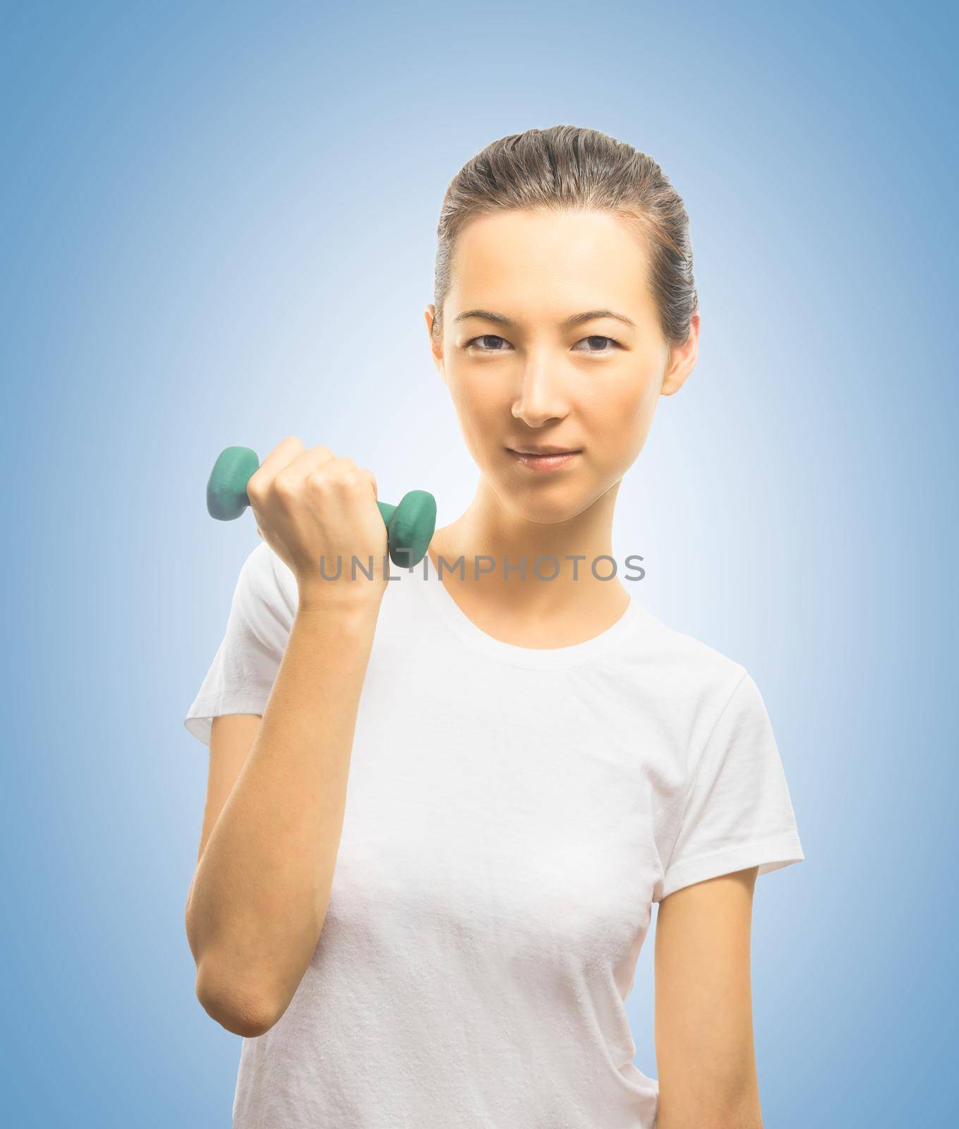 Woman smiles with a dumbbell by alexAleksei