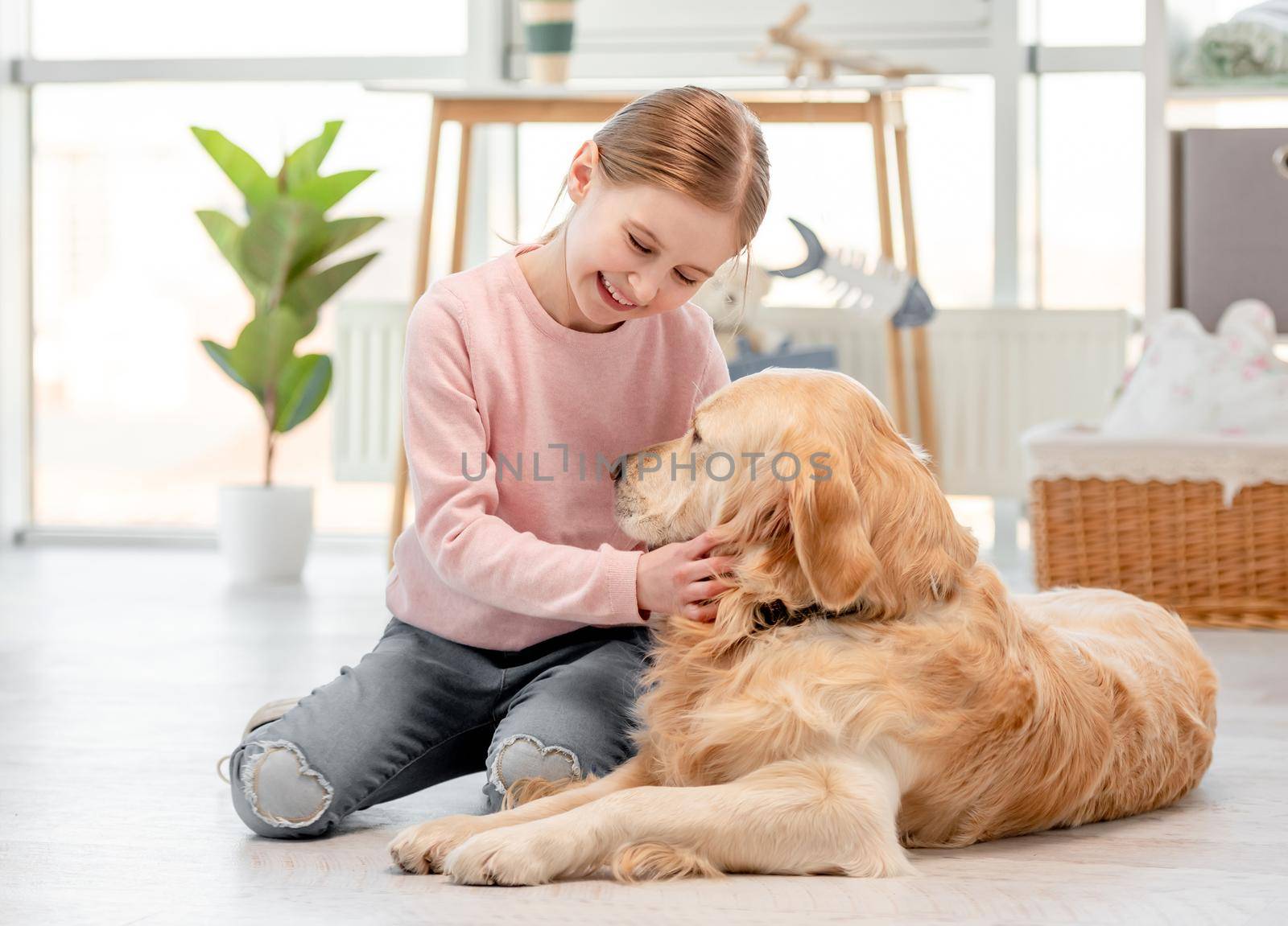 Little girl with golden retriever dog by tan4ikk1