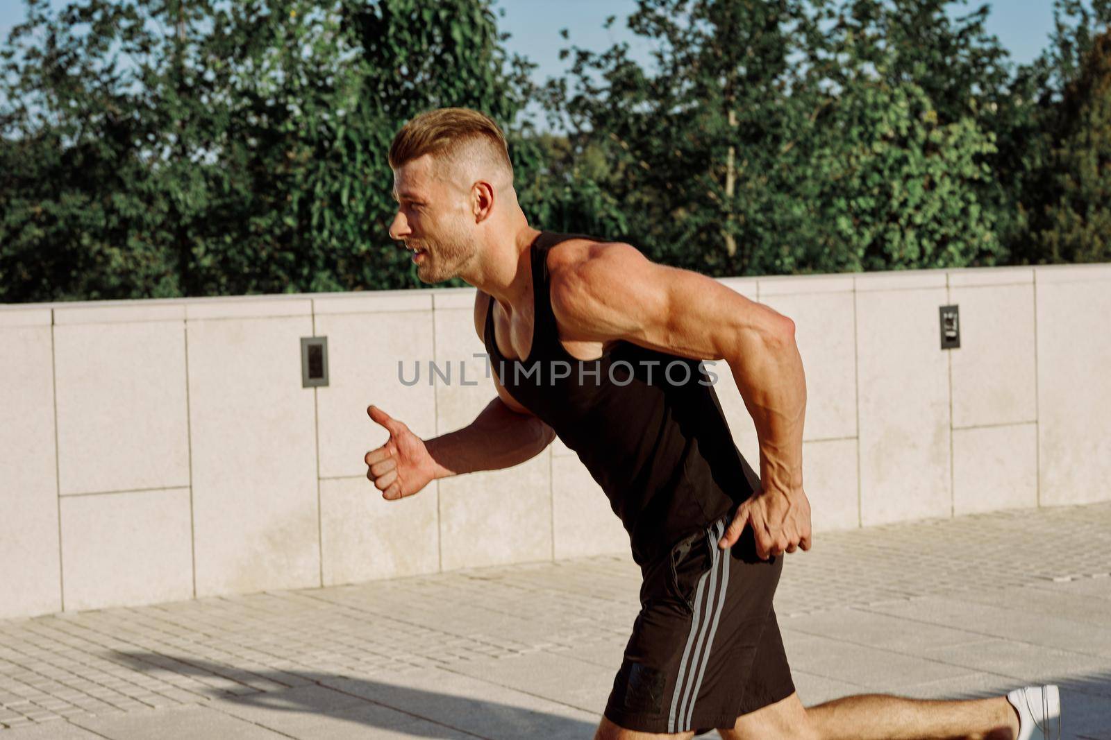 male athlete exercise outdoor fitness motivation muscle by Vichizh