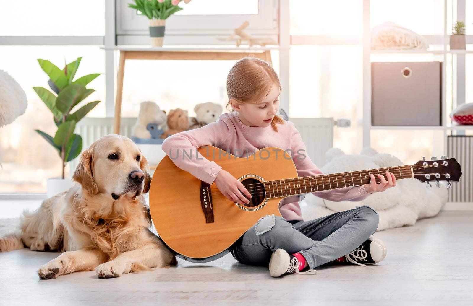 Little girl with guitar and golden retriever dog by tan4ikk1