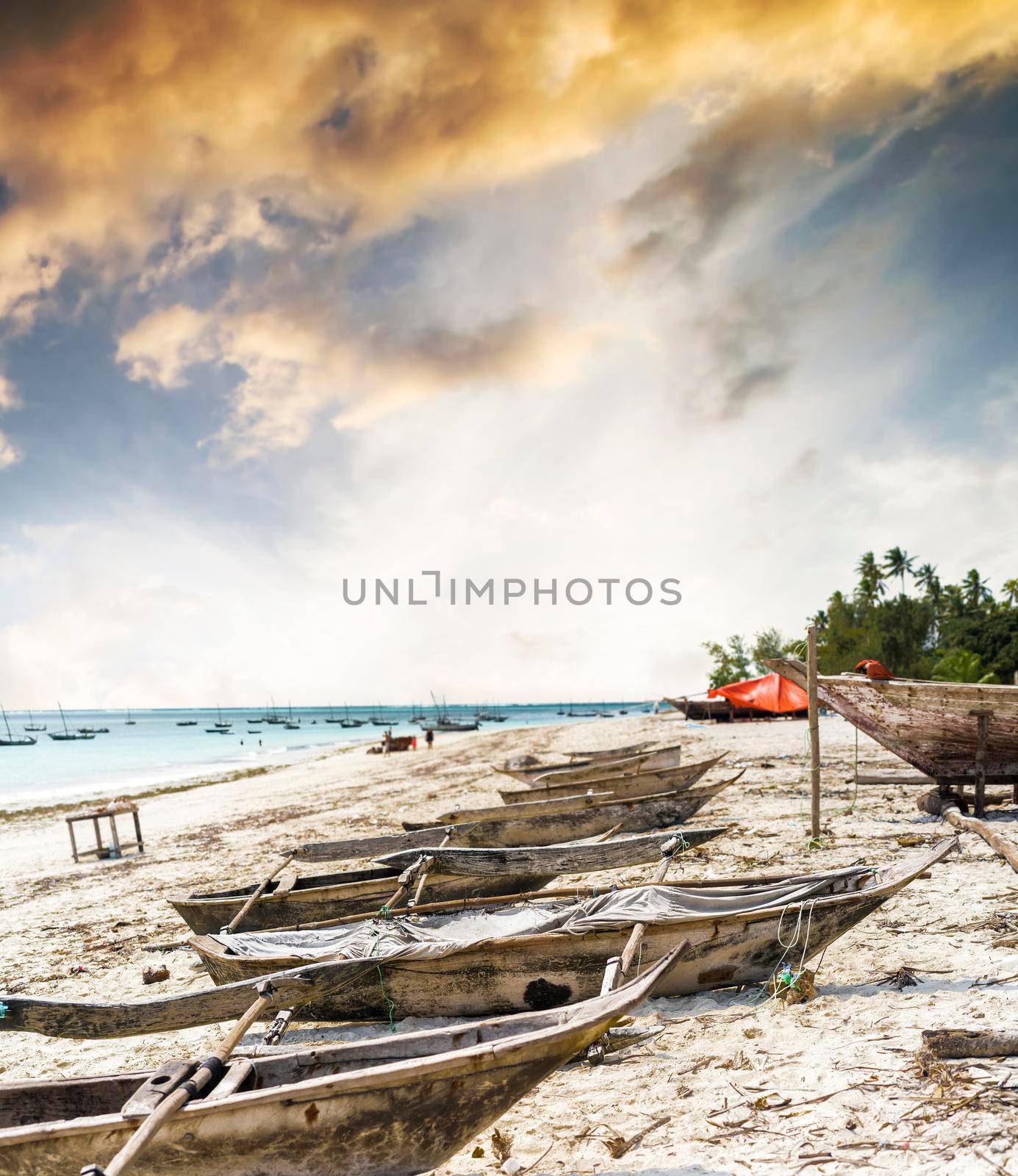 many old fishing boats on african seashore by GekaSkr