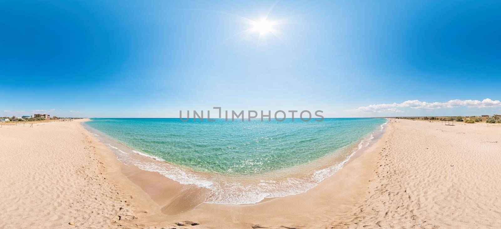 Deserted beach with white sand and crystal clear azure sea. blurred background for your text. concept of travel, ideal place for summer vacation by the sea in a safe place. Copy space. by panophotograph