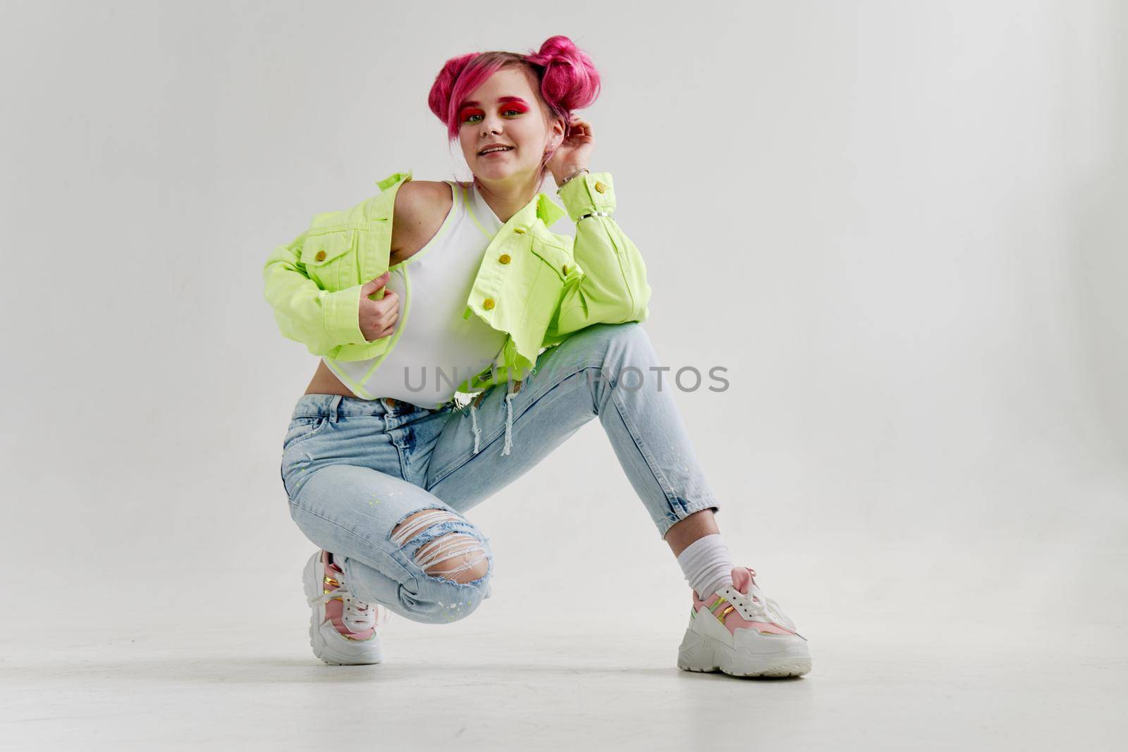 cheerful woman green jacket fashionable clothes isolated background. High quality photo