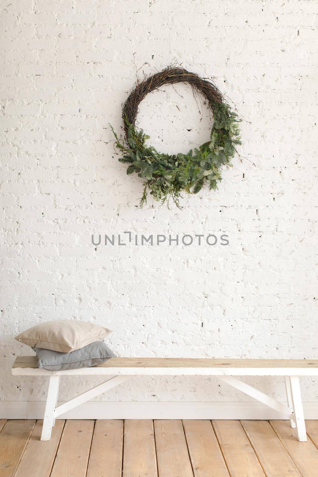 Wreath hanging over bench by Demkat