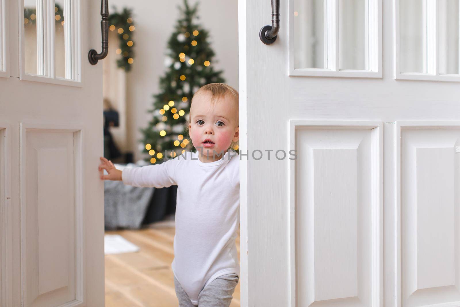 Charming kid in doorway of cozy bedroom by Demkat