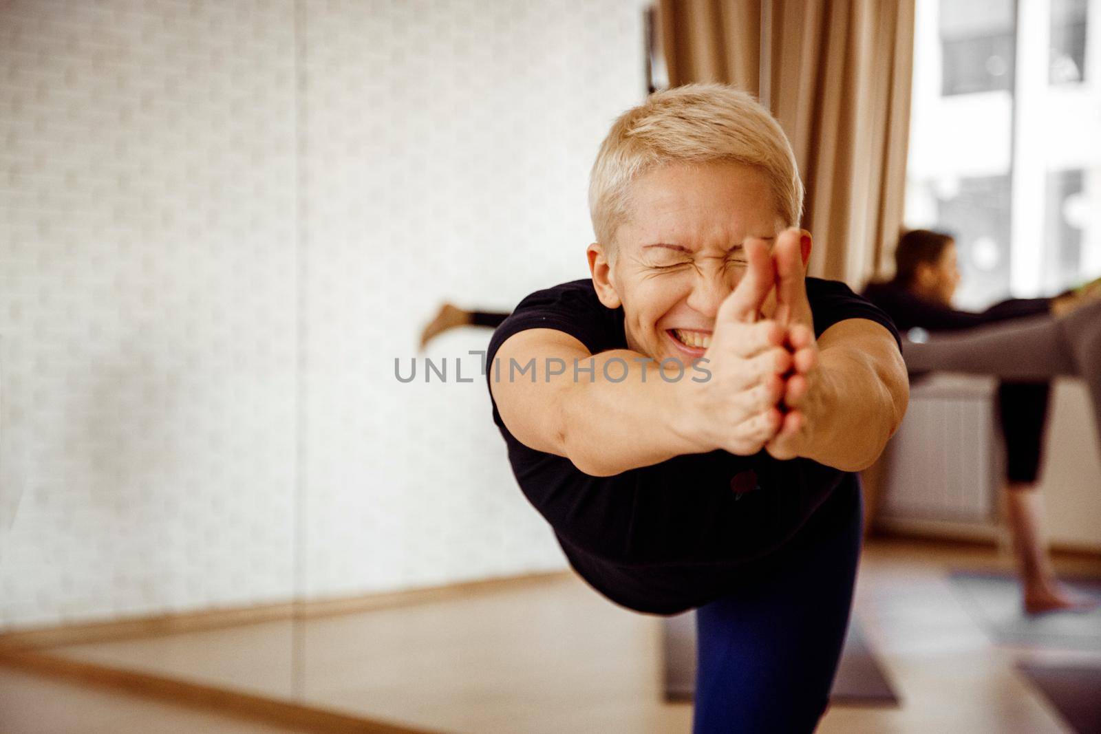 Emotional woman doing yoga by Demkat