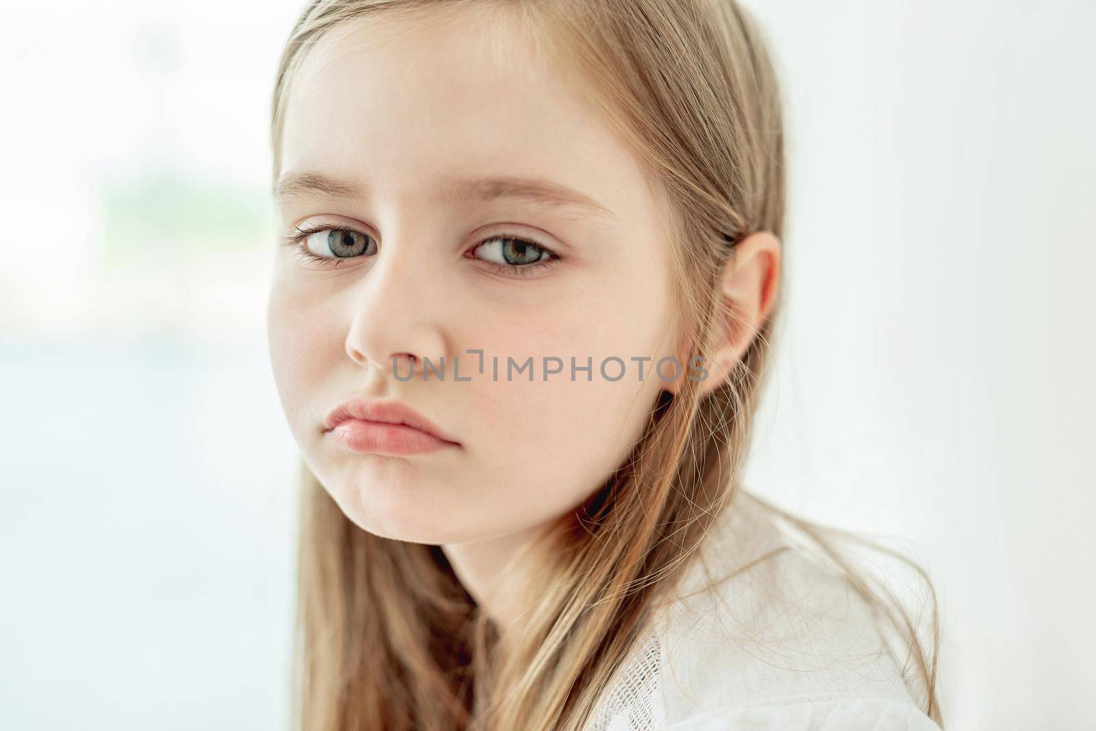 portrait of a little sad girl
