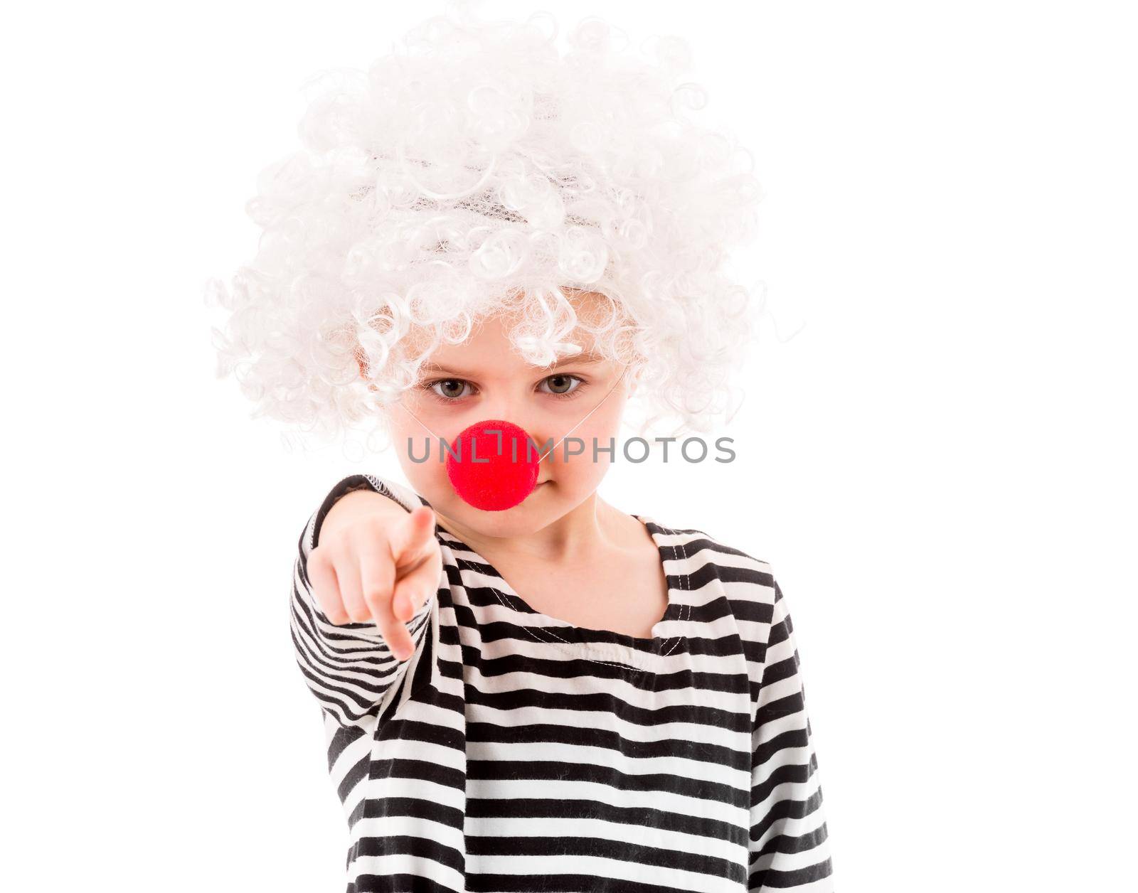 Little girl having fun hanging upside down while swinging isolated on white background