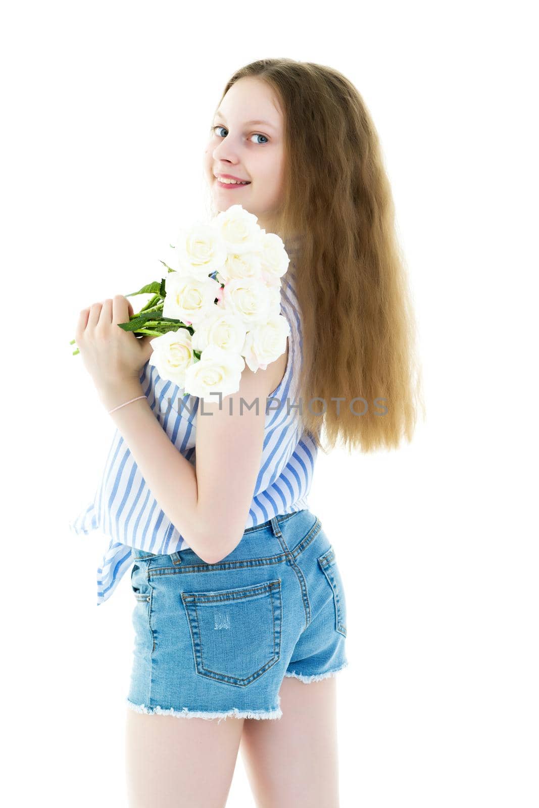 Little girl with a beautiful bouquet of flowers. The concept of holidays, family and children. Isolated on white background.